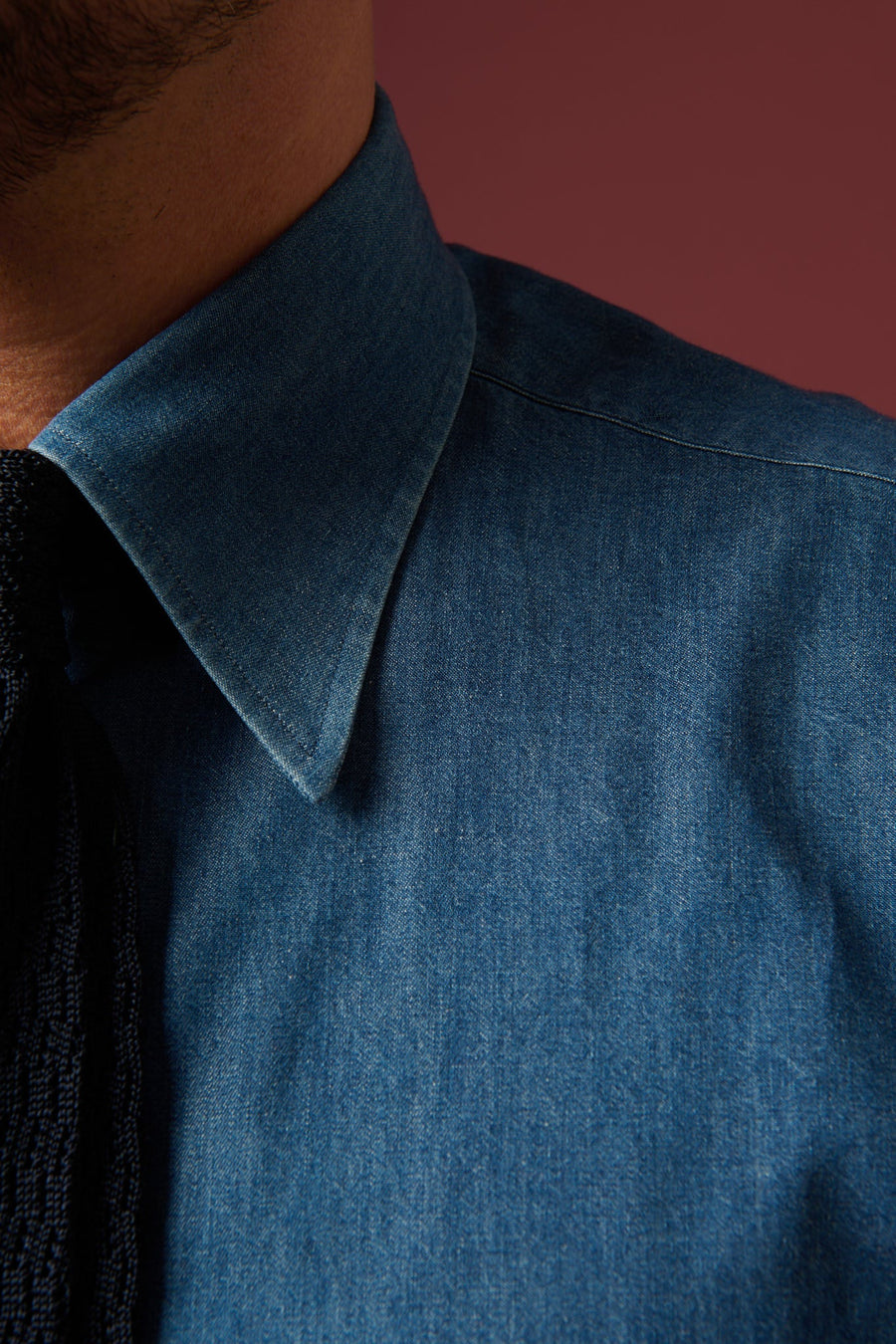 A blue denim shirt collar